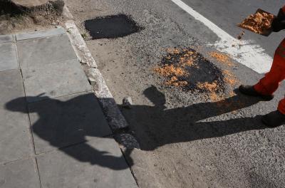 recuperação asfáltica na avenida monte cristo